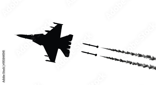 Military jet in flight leaving vapor trails a striking black silhouette