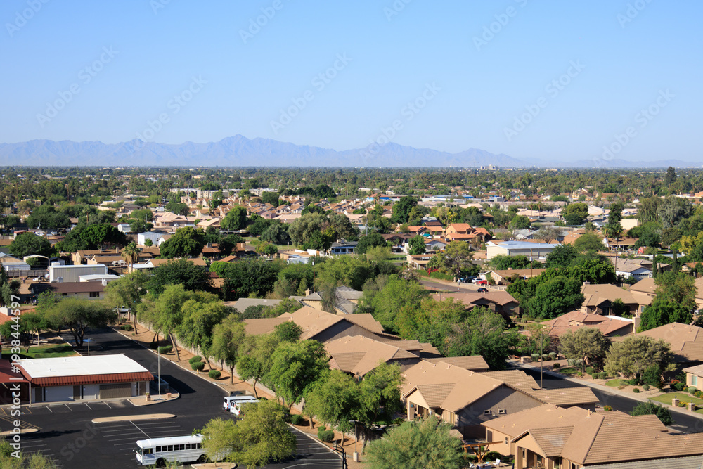 Fototapeta premium Aerial view of South mountain range, Phoenix downtown, Glendale and Peoria also known as Valley of the Sun, from the top of Vision Hills, Arizona