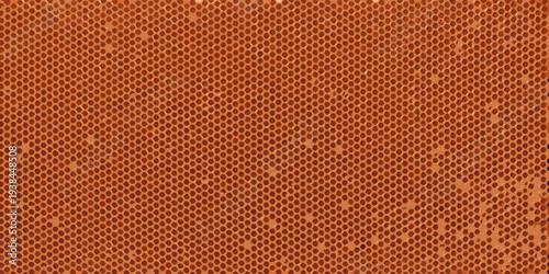 Close up of a basketball s surface showing its textured pattern