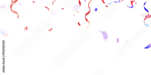 Colorful confetti and streamers falling against a dark background