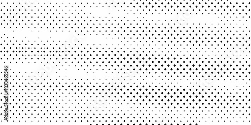 A dense allover pattern of small black diamonds on a white background