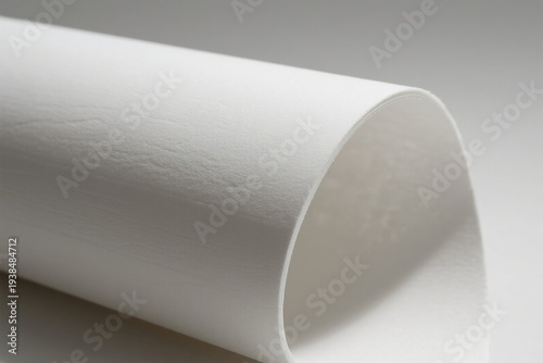 Closeup of a rolled white paper