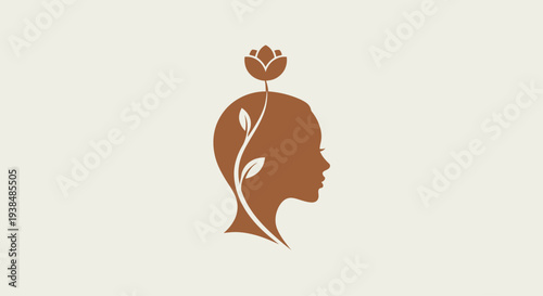 Silhouette of a woman's head with a blooming flower and plant growing from it.