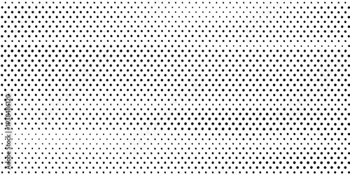 A dense pattern of black dots fading to white creating a gradient