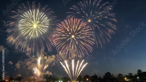 A magnificent pyrotechnic exhibition of brilliant hues and dazzling lights illuminating the nocturnal heavens for a festive celebration