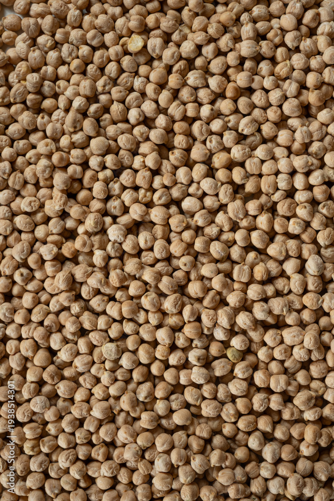 Fototapeta premium Raw uncooked chickpeas background top view.