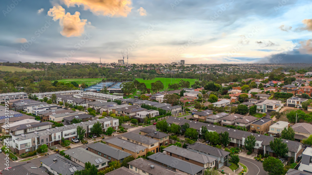 Obraz premium Panoramic Aerial Drone view of Inner Suburbs of Melbourne housing, roof tops, the streets and the parks, the roads and trees of Ascot Vale Moonee Ponds Brunswick Essendon and Maribyrnong in VIC Victor