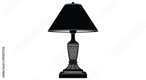 A black silhouette of a decorative table lamp with a patterned base on a white background