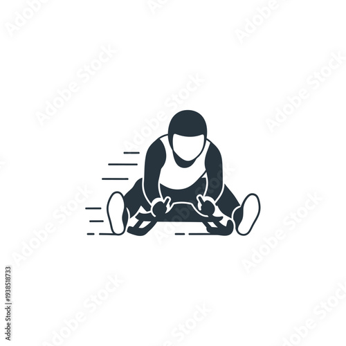 Man sitting on the floor with hands on knees in a relaxed pose.