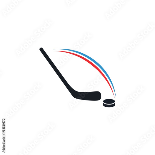 Hockey stick hitting a puck with motion blur effect.