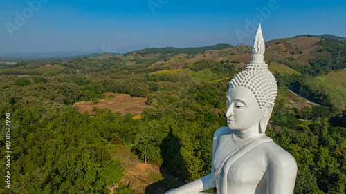 Принти на полотні The historic stupa of Wat Phra That Pu Jae in Phrae Province is a centuries old sacred site situated on a mountain