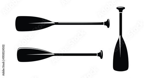 Two black canoe paddles displayed on a white background silhouette