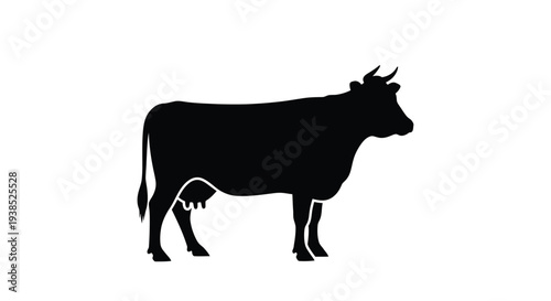 A black silhouette of a cow standing in profile silhouette