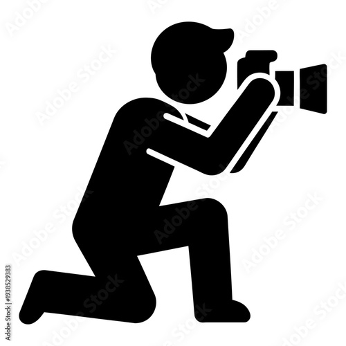 Photographer Silhouette Kneeling and Taking a Photo with a Professional Camera Icon