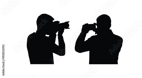 Two photographers aiming cameras captured in stark black form silhouette