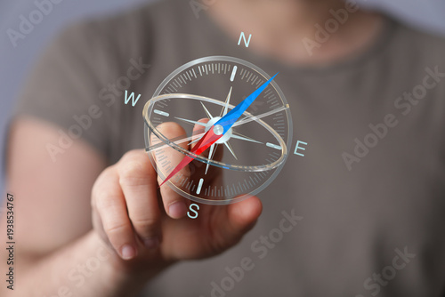 Hand holding a digital comp...