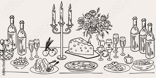 A celebratory table setting with champagne candles and a floral arrangement