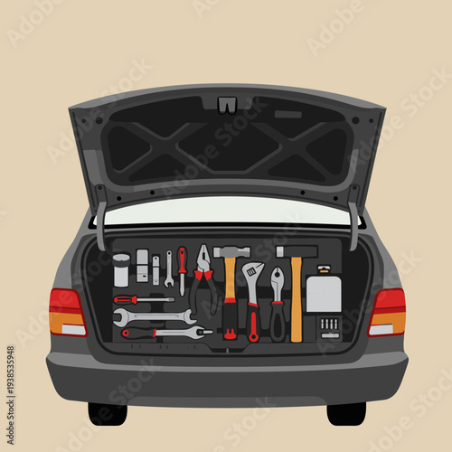 An organized car trunk filled with a comprehensive set of tools for various repair and maintenance tasks.