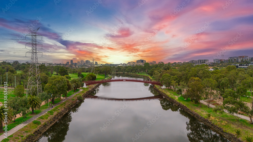 Obraz premium Panoramic Aerial Drone view of Inner Suburbs of Melbourne housing, roof tops, the streets and the parks, the roads and trees of Ascot Vale Moonee Ponds Brunswick Essendon and Maribyrnong in VIC Victor