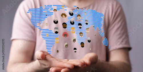 Person holding a world map ...