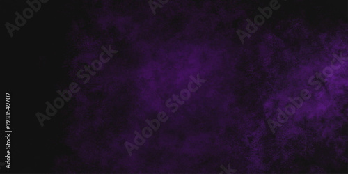 Freeze motion explosion of purple powder dust on a black background. abstract background with a textured gradient effect, suitable for wallpapers or graphic designs. Purple Smoke Cloudscape Texture.
