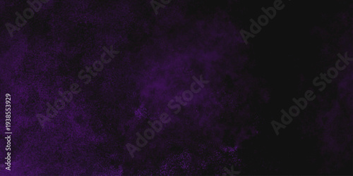 Freeze motion explosion of purple powder dust on a black background. abstract background with a textured gradient effect, suitable for wallpapers or graphic designs. Purple Smoke Cloudscape Texture.