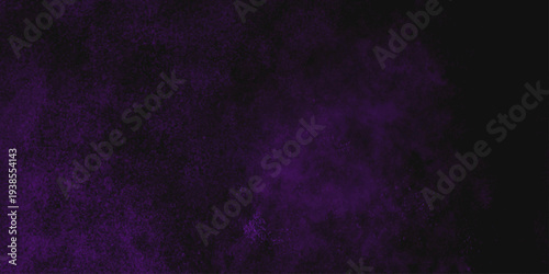 Freeze motion explosion of purple powder dust on a black background. abstract background with a textured gradient effect, suitable for wallpapers or graphic designs. Purple Smoke Cloudscape Texture.
