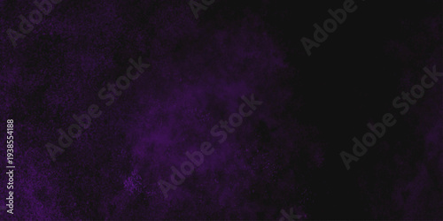 Freeze motion explosion of purple powder dust on a black background. abstract background with a textured gradient effect, suitable for wallpapers or graphic designs. Purple Smoke Cloudscape Texture.
