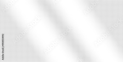 Gray and black dots scattered on a white background