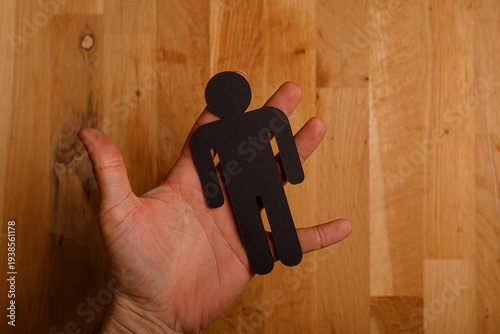 Black paper person silhouet...