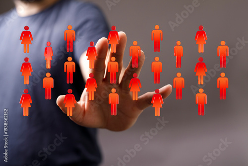 Hand reaching towards peopl...