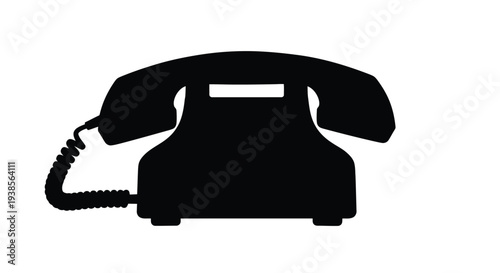 Black silhouette of a vintage rotary telephone on a white background