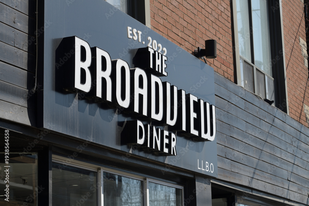 Fototapeta premium exterior building facade and sign of The Broadview Diner located at 757 Broadview Av, Toronto