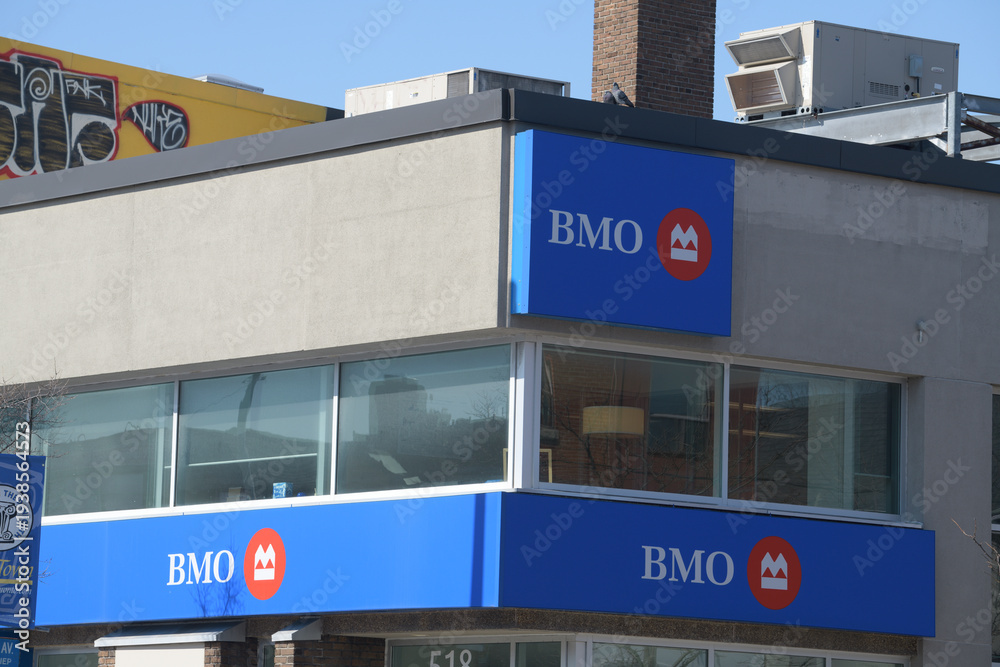 Fototapeta premium exterior building facade and sign at BMO Bank of Montreal located here at 518 Danforth Av, Toronto