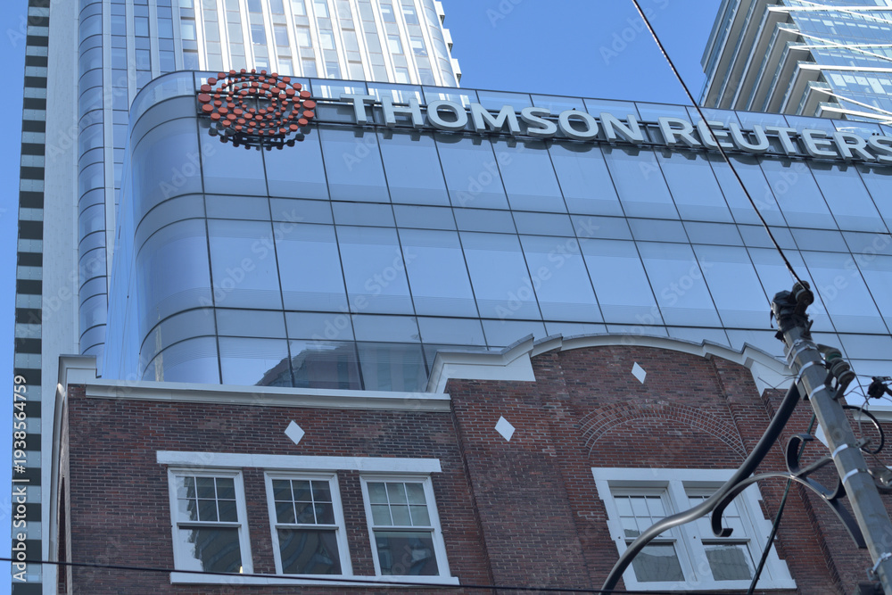Obraz premium sign on the exterior of Thomson Reuters, a mixed use business and condo tower at 19 Duncan St, Toronto