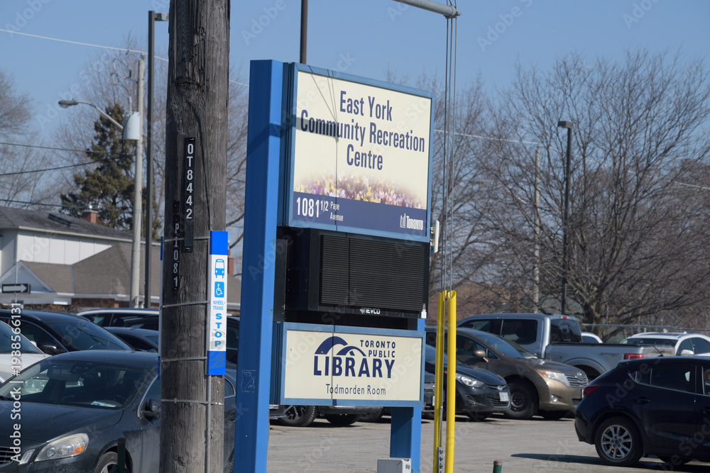 Fototapeta premium roadside sign at East York Community Recreation Centre and Toronto Public Library - Todmorden Room Branch, 1081 1/2 Pape Av