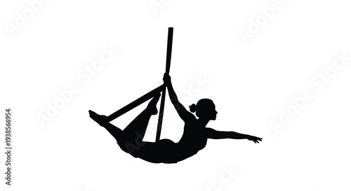 A striking black silhouette depicts a person dynamically suspended in an aerial yoga pose showcasing flexibility and balance silhouette