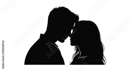 A tender moment is captured as a couple embraces closely their forms defined as a striking silhouette high quality