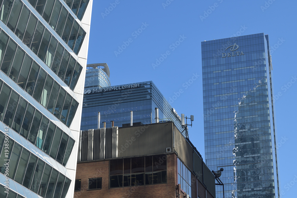 Fototapeta premium looking south on Simcoe St to TD Terrace (left), MarshMcLennen (Southcore Financial Centre) and Delta hotel at 75 Lower Simcoe St, Toronto
