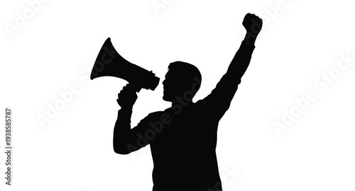 Man shouting into megaphone with raised fist a striking silhouette