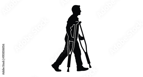 Man using crutches walks forward a striking black silhouette