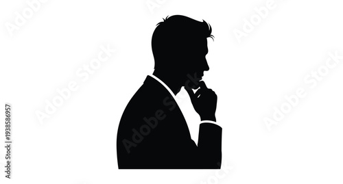 A thoughtful man in a suit lost in contemplation silhouette