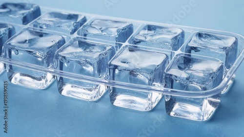 Closeup of a plastic ice cube tray, clean composition ample negative space