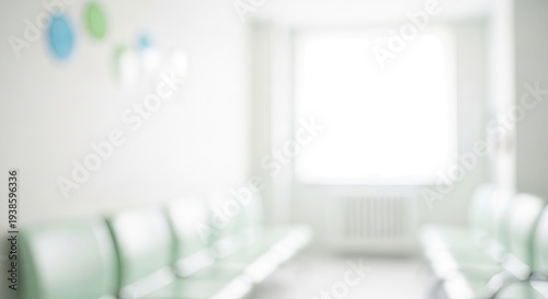Blurry interior room with white furniture.
