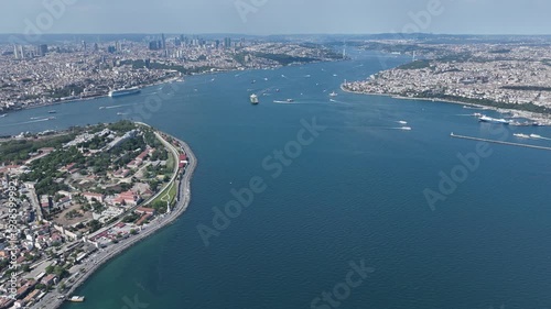 Time-lapse footage of Istanbul, Hagia Sophia, the Bosphorus bridges and harbor, and an aerial shot of a bridge shrouded in fog.