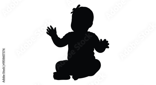 Silhouette of a baby sitting and waving with raised hands