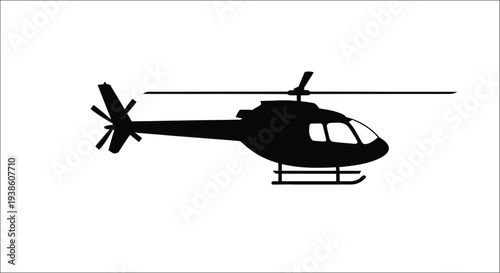 Black silhouette of a helicopter against a plain white background
