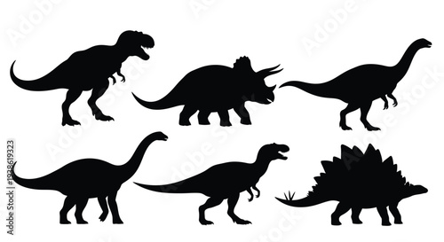 A collection of prehistoric dinosaurs in black silhouettes