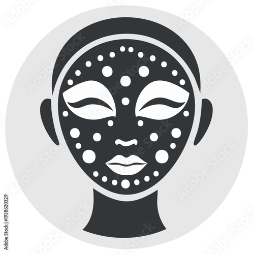 Stylized face with a charcoal mask and white polka dots representing skin care and beauty treatment