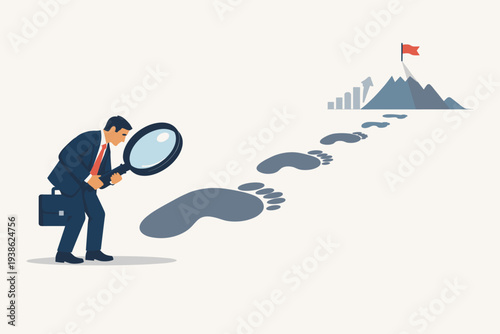 Businessman with magnifying glass following giant footprints to a mountain peak with a red flag and growth chart, symbolizing career path, strategic scaling, ambition, and business success.